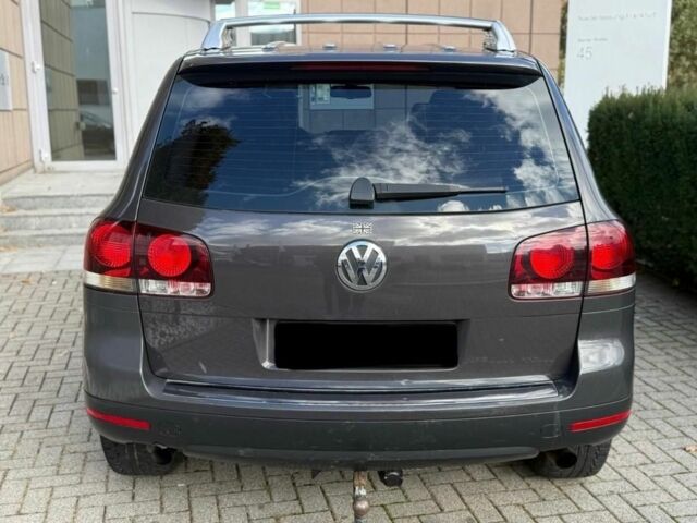 Серый Фольксваген Туарег, объемом двигателя 3 л и пробегом 213 тыс. км за 3455 $, фото 5 на Automoto.ua