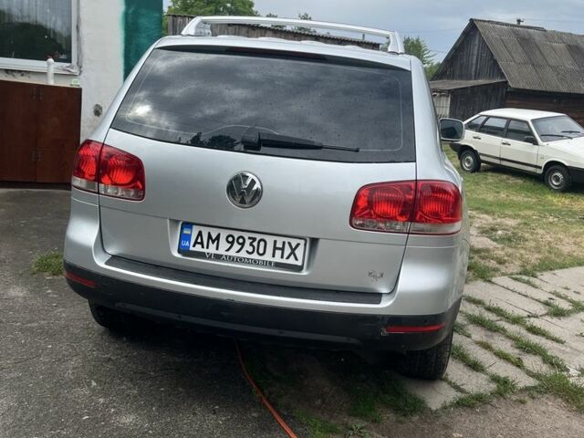 Серый Фольксваген Туарег, объемом двигателя 3 л и пробегом 400 тыс. км за 9000 $, фото 9 на Automoto.ua