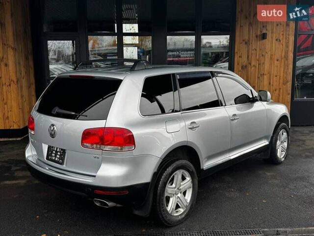 Серый Фольксваген Туарег, объемом двигателя 4.2 л и пробегом 309 тыс. км за 6999 $, фото 9 на Automoto.ua