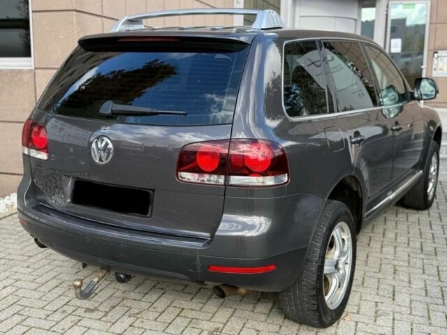 Серый Фольксваген Туарег, объемом двигателя 3 л и пробегом 213 тыс. км за 3455 $, фото 4 на Automoto.ua