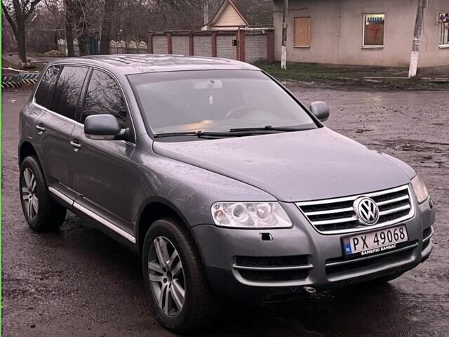 Серый Фольксваген Туарег, объемом двигателя 2.5 л и пробегом 350 тыс. км за 4700 $, фото 2 на Automoto.ua