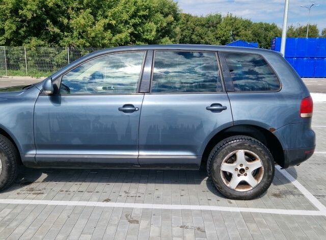 Сірий Фольксваген Туарег, об'ємом двигуна 2.5 л та пробігом 310 тис. км за 3650 $, фото 1 на Automoto.ua