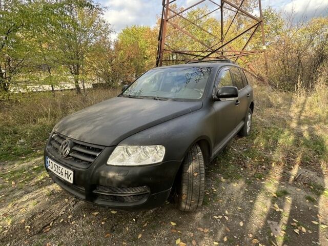 Серый Фольксваген Туарег, объемом двигателя 2.5 л и пробегом 290 тыс. км за 6300 $, фото 6 на Automoto.ua