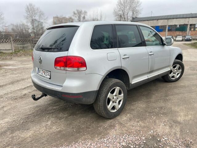 Серый Фольксваген Туарег, объемом двигателя 3 л и пробегом 340 тыс. км за 5500 $, фото 4 на Automoto.ua