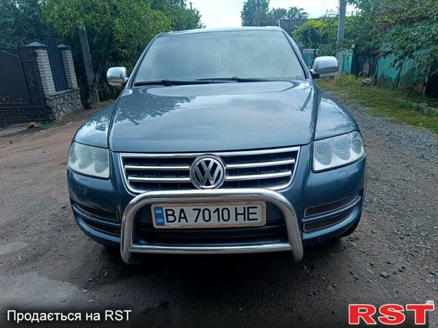 Серый Фольксваген Туарег, объемом двигателя 3.2 л и пробегом 300 тыс. км за 8500 $, фото 4 на Automoto.ua