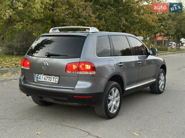 Серый Фольксваген Туарег, объемом двигателя 3 л и пробегом 220 тыс. км за 8250 $, фото 55 на Automoto.ua