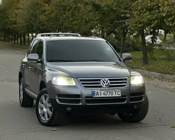 Серый Фольксваген Туарег, объемом двигателя 3 л и пробегом 220 тыс. км за 8250 $, фото 4 на Automoto.ua