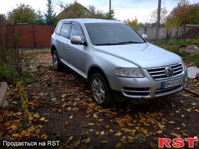 Серый Фольксваген Туарег, объемом двигателя 3.2 л и пробегом 400 тыс. км за 4900 $, фото 7 на Automoto.ua