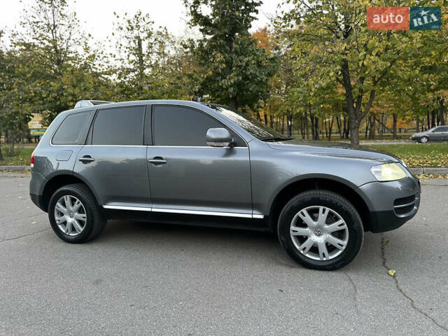 Серый Фольксваген Туарег, объемом двигателя 3 л и пробегом 220 тыс. км за 8250 $, фото 53 на Automoto.ua