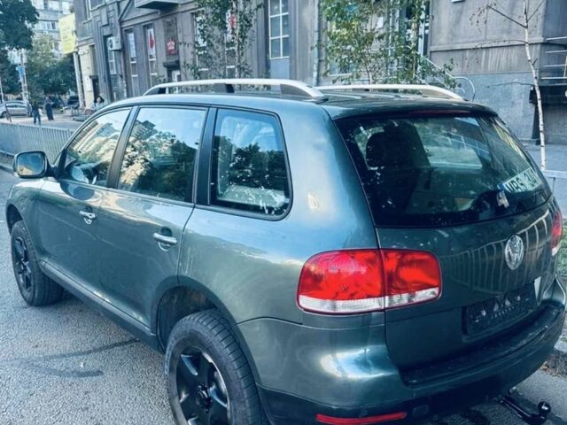 Серый Фольксваген Туарег, объемом двигателя 2.5 л и пробегом 350 тыс. км за 4700 $, фото 3 на Automoto.ua