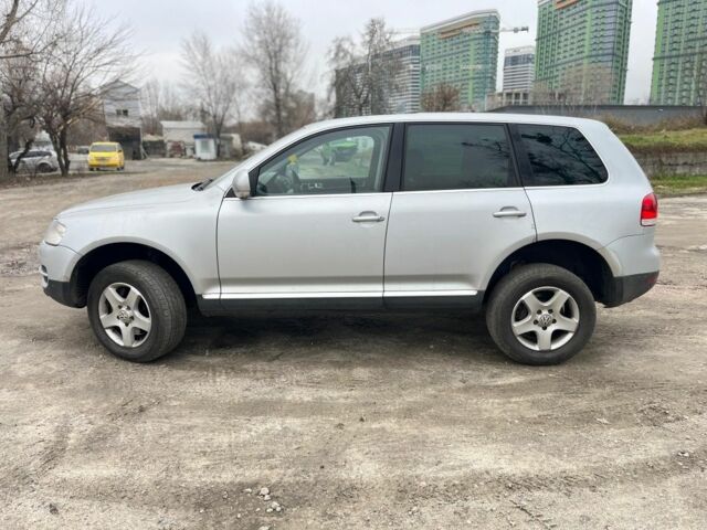 Серый Фольксваген Туарег, объемом двигателя 3 л и пробегом 340 тыс. км за 5500 $, фото 2 на Automoto.ua