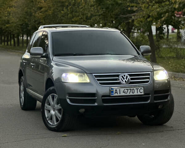 Серый Фольксваген Туарег, объемом двигателя 3 л и пробегом 220 тыс. км за 8250 $, фото 28 на Automoto.ua