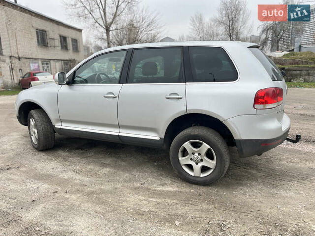 Серый Фольксваген Туарег, объемом двигателя 3 л и пробегом 340 тыс. км за 5500 $, фото 4 на Automoto.ua