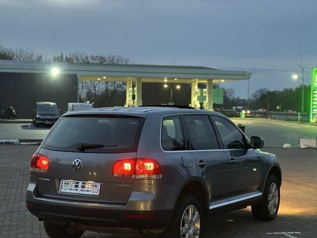 Серый Фольксваген Туарег, объемом двигателя 3 л и пробегом 340 тыс. км за 5350 $, фото 5 на Automoto.ua