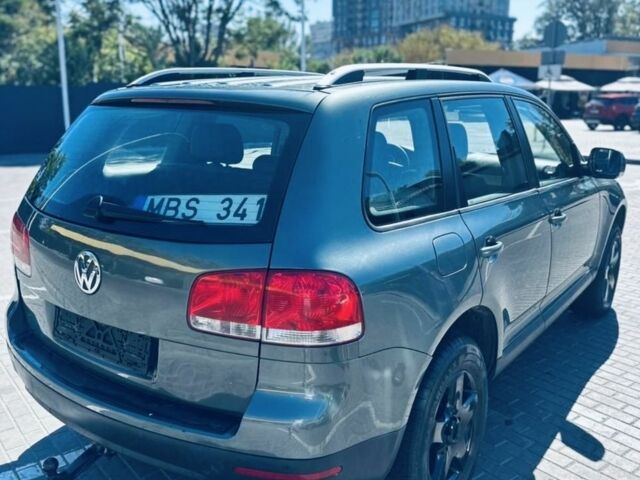 Серый Фольксваген Туарег, объемом двигателя 2.5 л и пробегом 350 тыс. км за 4700 $, фото 2 на Automoto.ua