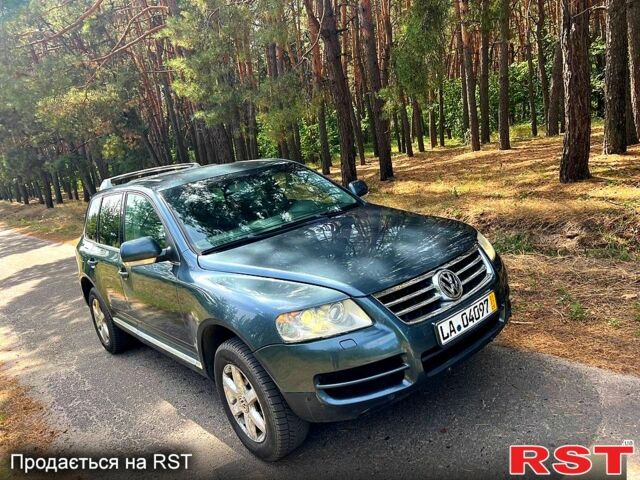 Серый Фольксваген Туарег, объемом двигателя 2.5 л и пробегом 290 тыс. км за 4000 $, фото 4 на Automoto.ua