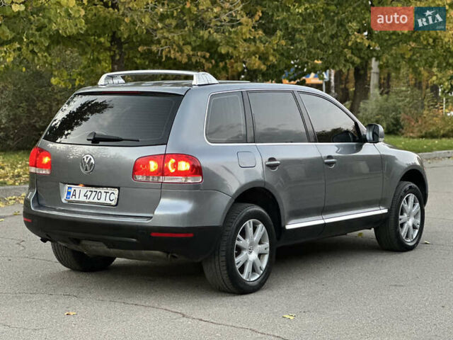 Серый Фольксваген Туарег, объемом двигателя 3 л и пробегом 220 тыс. км за 8250 $, фото 24 на Automoto.ua
