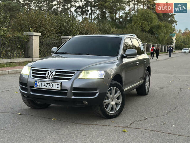 Серый Фольксваген Туарег, объемом двигателя 3 л и пробегом 220 тыс. км за 8250 $, фото 6 на Automoto.ua