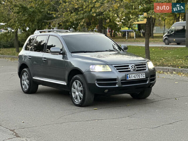 Серый Фольксваген Туарег, объемом двигателя 3 л и пробегом 220 тыс. км за 8250 $, фото 52 на Automoto.ua