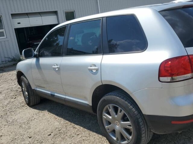 Серый Фольксваген Туарег, объемом двигателя 3 л и пробегом 290 тыс. км за 5800 $, фото 5 на Automoto.ua