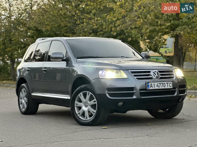 Серый Фольксваген Туарег, объемом двигателя 3 л и пробегом 220 тыс. км за 8250 $, фото 56 на Automoto.ua