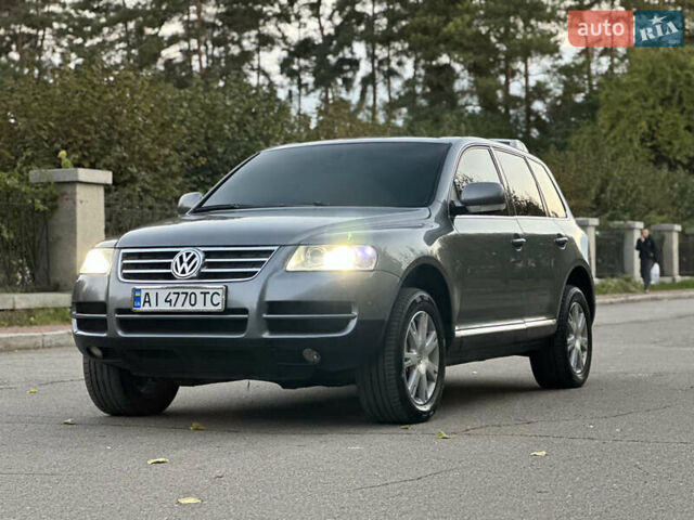 Серый Фольксваген Туарег, объемом двигателя 3 л и пробегом 220 тыс. км за 8250 $, фото 51 на Automoto.ua