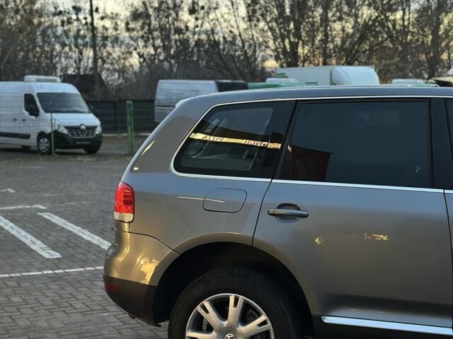 Серый Фольксваген Туарег, объемом двигателя 3 л и пробегом 340 тыс. км за 5350 $, фото 6 на Automoto.ua