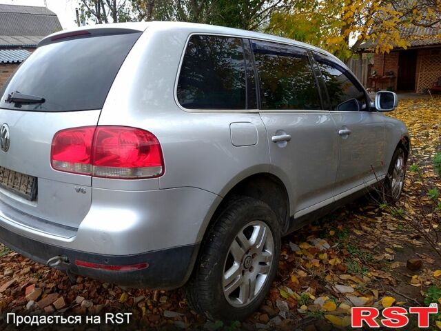 Серый Фольксваген Туарег, объемом двигателя 3.2 л и пробегом 400 тыс. км за 4900 $, фото 5 на Automoto.ua