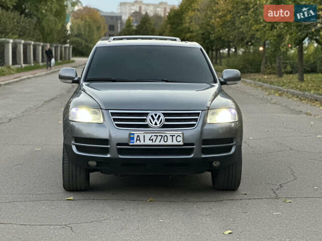 Серый Фольксваген Туарег, объемом двигателя 3 л и пробегом 220 тыс. км за 8250 $, фото 1 на Automoto.ua