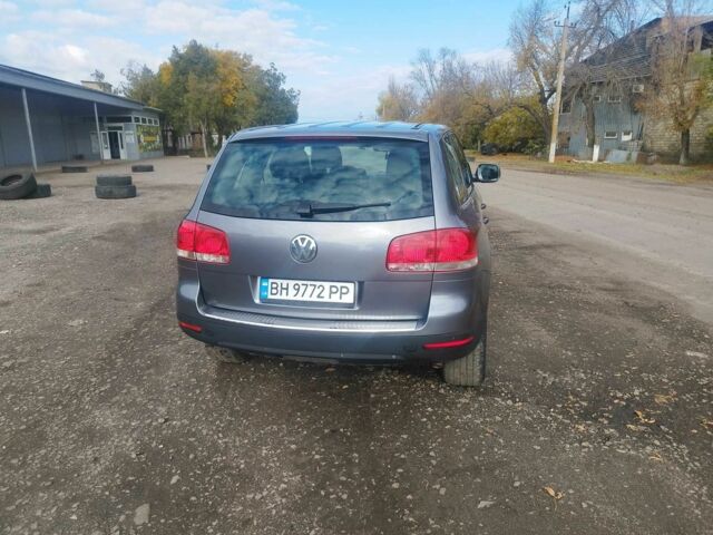 Серый Фольксваген Туарег, объемом двигателя 3 л и пробегом 450 тыс. км за 10900 $, фото 8 на Automoto.ua