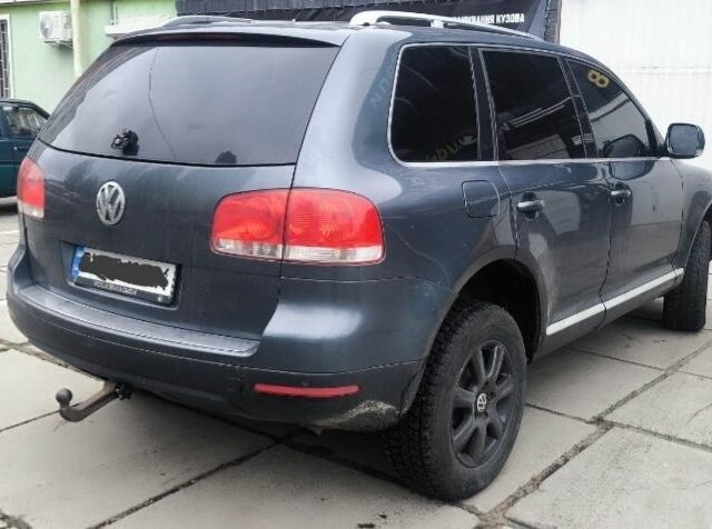 Серый Фольксваген Туарег, объемом двигателя 0 л и пробегом 312 тыс. км за 5900 $, фото 1 на Automoto.ua