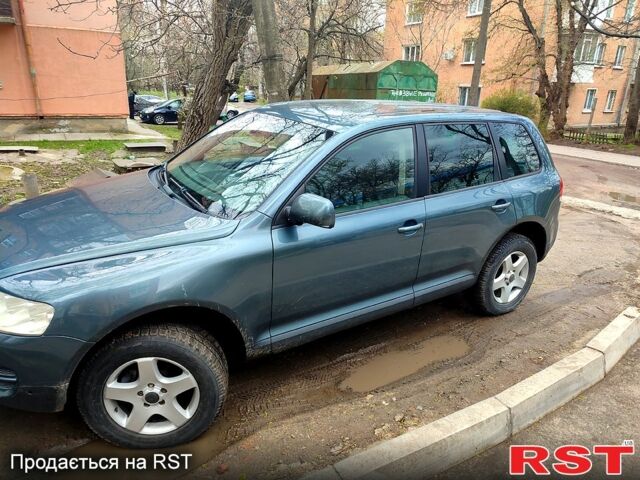 Сірий Фольксваген Туарег, об'ємом двигуна 2.5 л та пробігом 290 тис. км за 8000 $, фото 4 на Automoto.ua