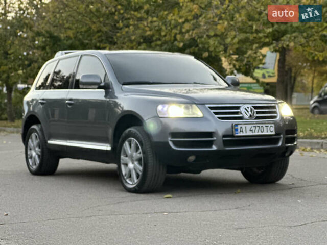 Серый Фольксваген Туарег, объемом двигателя 3 л и пробегом 220 тыс. км за 8250 $, фото 7 на Automoto.ua