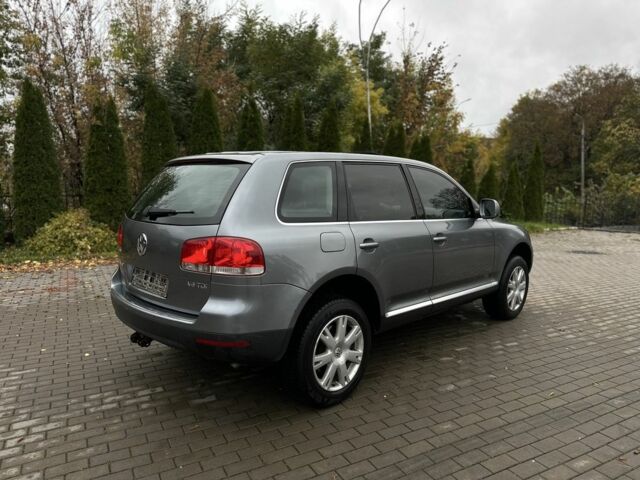 Серый Фольксваген Туарег, объемом двигателя 3 л и пробегом 370 тыс. км за 5450 $, фото 3 на Automoto.ua