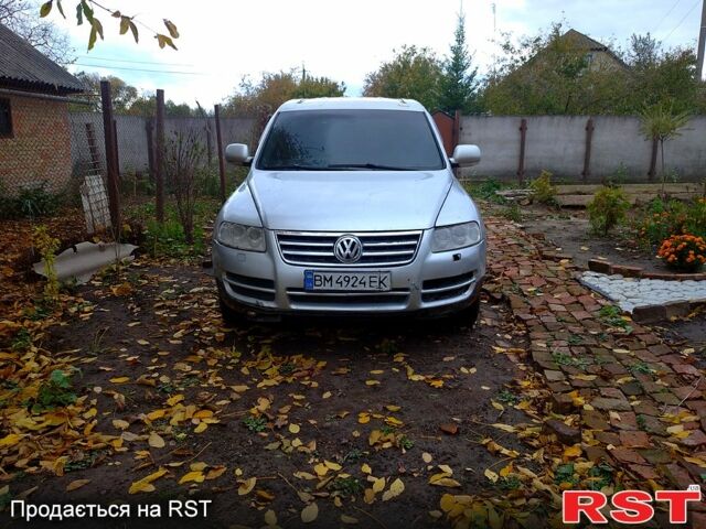 Серый Фольксваген Туарег, объемом двигателя 3.2 л и пробегом 400 тыс. км за 4900 $, фото 8 на Automoto.ua