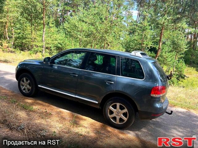 Серый Фольксваген Туарег, объемом двигателя 2.5 л и пробегом 290 тыс. км за 4000 $, фото 5 на Automoto.ua