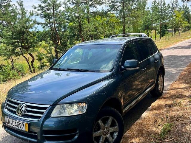 Серый Фольксваген Туарег, объемом двигателя 2.5 л и пробегом 290 тыс. км за 4000 $, фото 3 на Automoto.ua