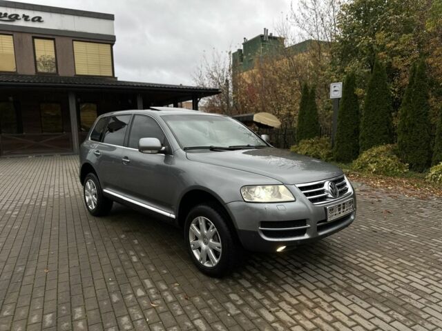 Серый Фольксваген Туарег, объемом двигателя 3 л и пробегом 370 тыс. км за 5450 $, фото 2 на Automoto.ua