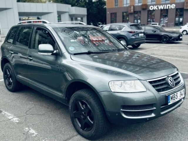 Серый Фольксваген Туарег, объемом двигателя 2.5 л и пробегом 350 тыс. км за 4700 $, фото 1 на Automoto.ua