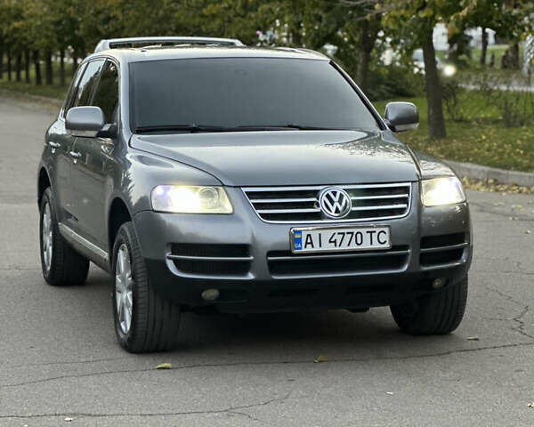 Серый Фольксваген Туарег, объемом двигателя 3 л и пробегом 220 тыс. км за 8250 $, фото 54 на Automoto.ua