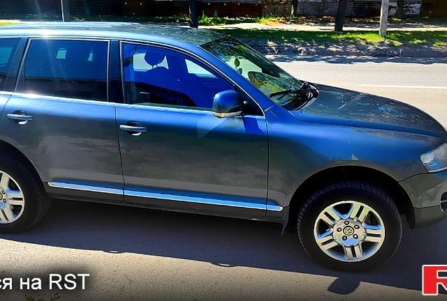 Сірий Фольксваген Туарег, об'ємом двигуна 3.2 л та пробігом 404 тис. км за 8000 $, фото 2 на Automoto.ua