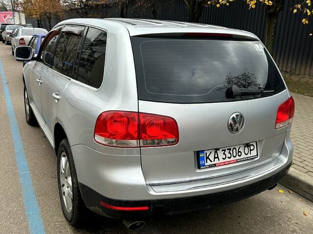 Сірий Фольксваген Туарег, об'ємом двигуна 3.2 л та пробігом 327 тис. км за 9500 $, фото 1 на Automoto.ua