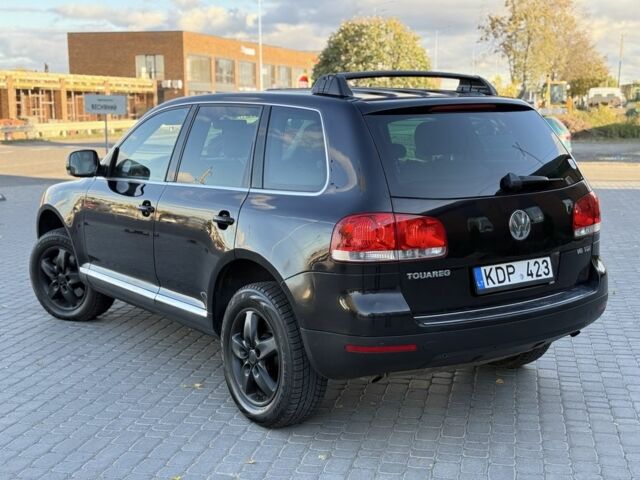 Сірий Фольксваген Туарег, об'ємом двигуна 3 л та пробігом 300 тис. км за 6900 $, фото 3 на Automoto.ua