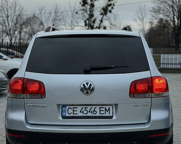 Серый Фольксваген Туарег, объемом двигателя 3 л и пробегом 295 тыс. км за 9700 $, фото 4 на Automoto.ua