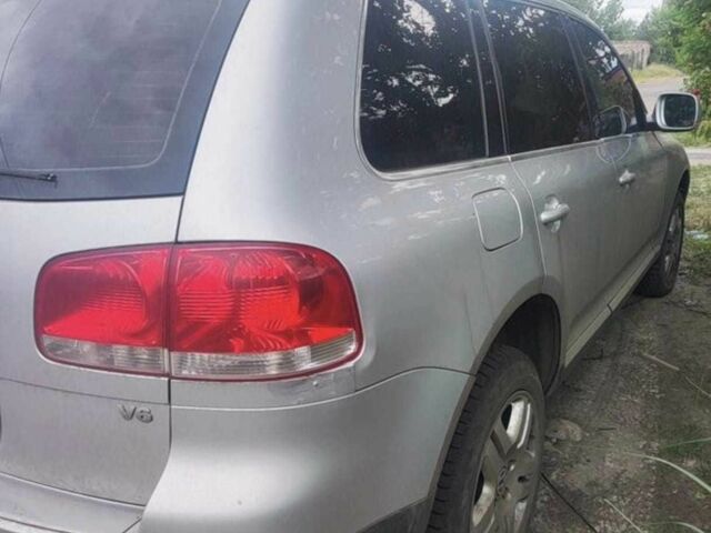 Серый Фольксваген Туарег, объемом двигателя 3.2 л и пробегом 154 тыс. км за 7000 $, фото 5 на Automoto.ua