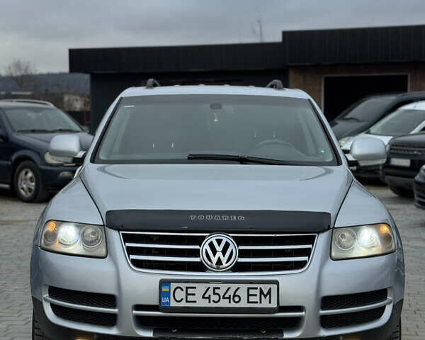 Серый Фольксваген Туарег, объемом двигателя 3 л и пробегом 295 тыс. км за 9700 $, фото 1 на Automoto.ua