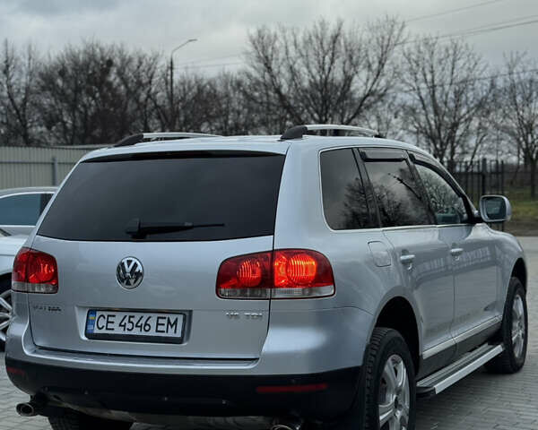 Серый Фольксваген Туарег, объемом двигателя 3 л и пробегом 295 тыс. км за 9700 $, фото 3 на Automoto.ua