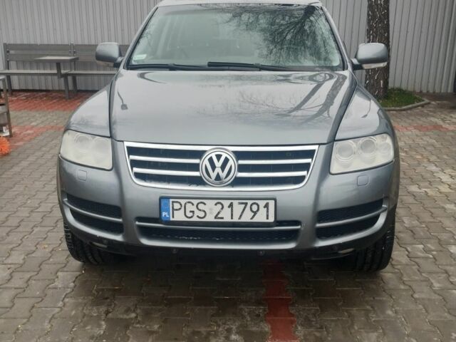 Серый Фольксваген Туарег, объемом двигателя 3 л и пробегом 270 тыс. км за 5700 $, фото 2 на Automoto.ua