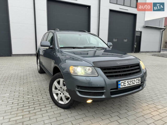 Сірий Фольксваген Туарег, об'ємом двигуна 3 л та пробігом 390 тис. км за 8700 $, фото 2 на Automoto.ua