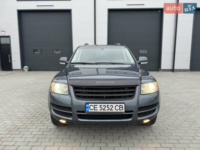 Сірий Фольксваген Туарег, об'ємом двигуна 3 л та пробігом 390 тис. км за 8700 $, фото 6 на Automoto.ua